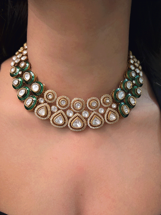 Uncut polki and moissanite studded classy set with green enamel detailing on both sides