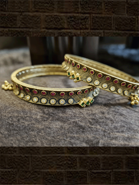 Black gold finish set of two kada's with polki,ruby and green stones and hanging ghunghru's - Odara Jewellery