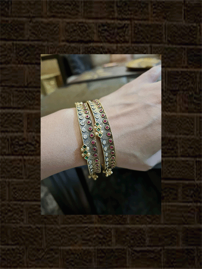 Black gold finish set of two kada's with polki,ruby and green stones and hanging ghunghru's - Odara Jewellery