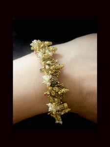Ganpatiji design openable kada with ruby green stones and bead hangings(set of two)