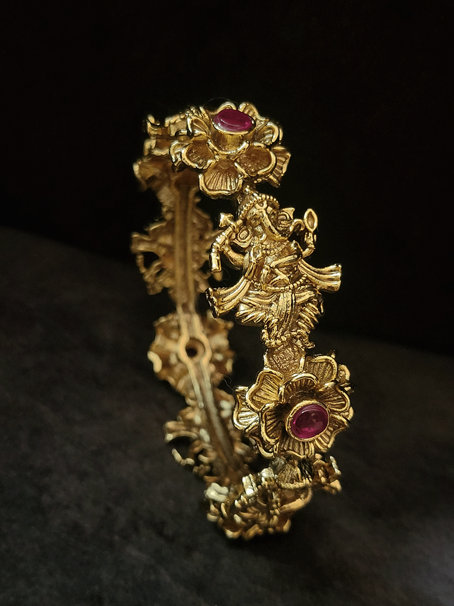 Set of two dancing ganpatiji openable kada's with ruby stone on flower design