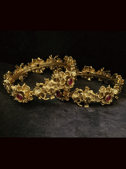 Set of two dancing ganpatiji openable kada's with ruby stone on flower design