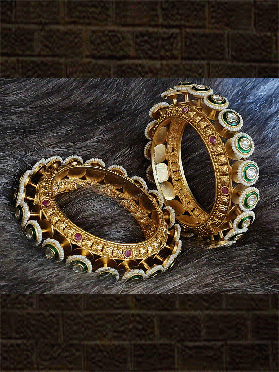 Kundan with enamel and pirohi openable pacheli with ruby stones on sides(Set of two) - Odara Jewellery