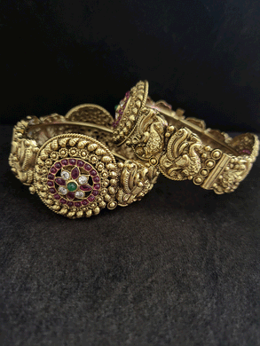 Circular design with ruby,green and white stones in peacock design openable kadas(set of two) - Odara Jewellery