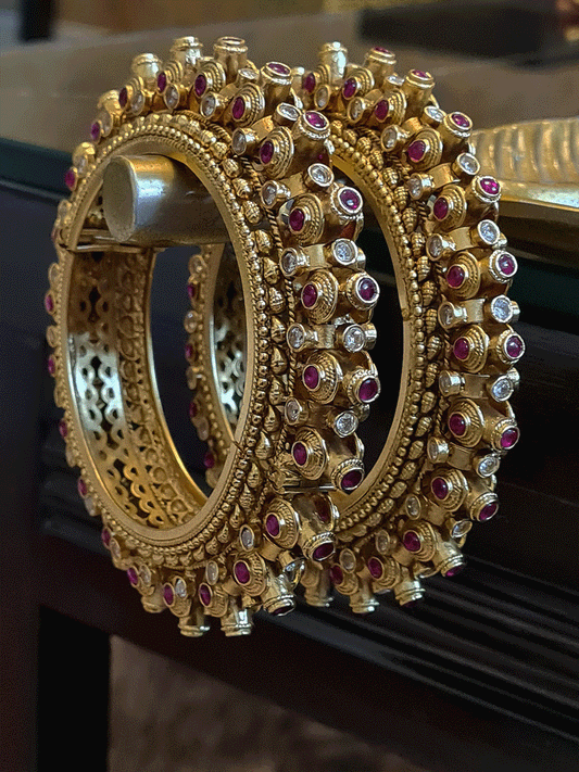 Polki and ruby stone studded circular design openable pacheli kada's (set of two) - Odara Jewellery