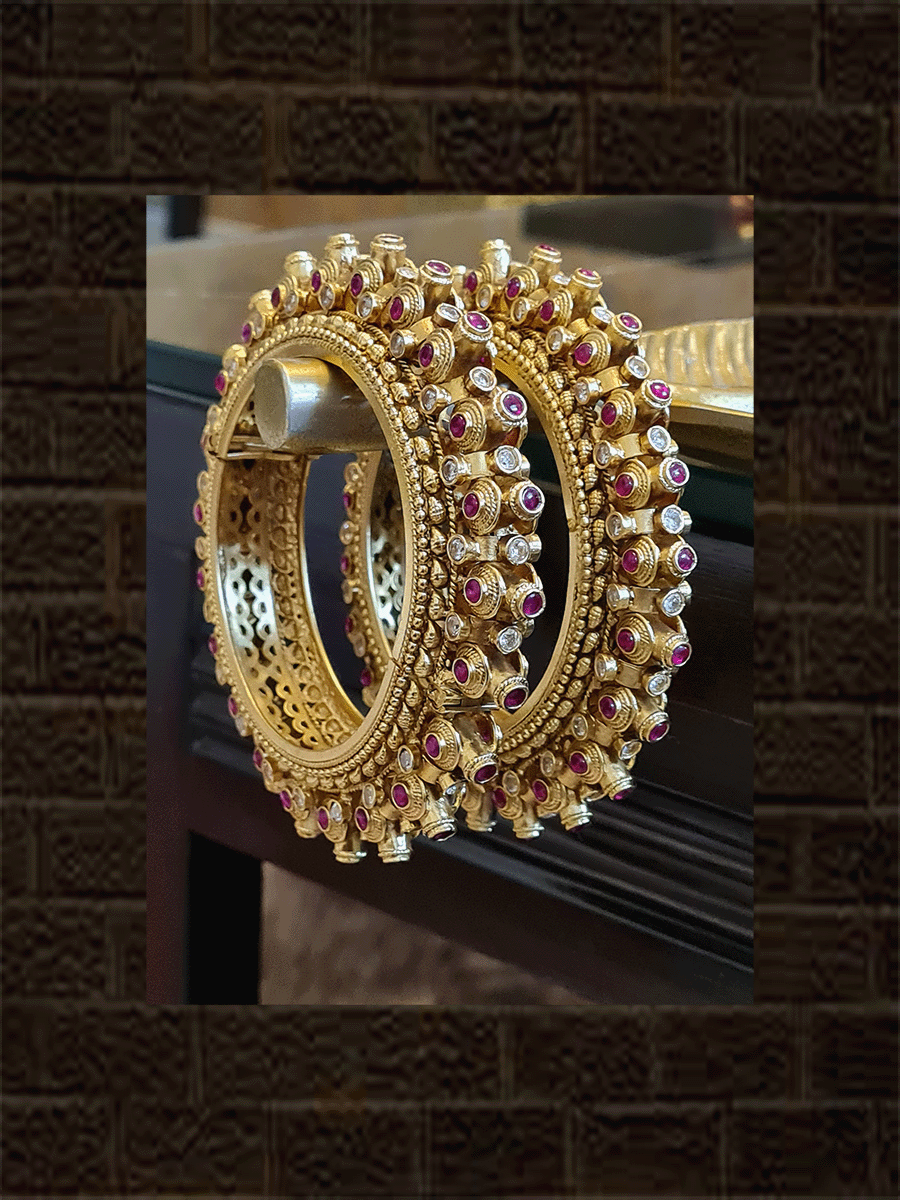 Polki and ruby stone studded circular design openable pacheli kada's (set of two) - Odara Jewellery