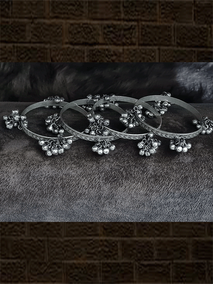 Set of four oxidised self heart design hanging ghunghru bangles - Odara Jewellery