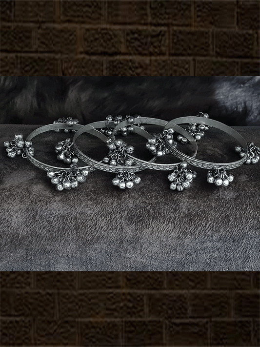 Set of four oxidised self heart design hanging ghunghru bangles - Odara Jewellery