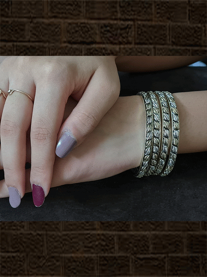 Leaf design oxidised dual tone bangles(set of four) - Odara Jewellery