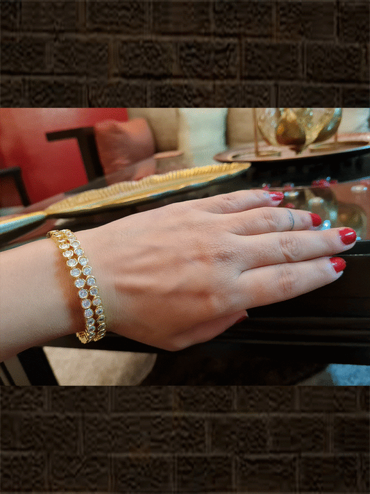 Set of two white round zircon bangles in gold finish - Odara Jewellery