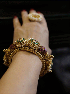 Set of two openable kadas with peacocks and also kundan with green stone flower tukdies with pearly hangings - Odara Jewellery