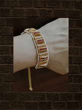 Load image into Gallery viewer, Broad gold chain with side pirohi work and kundan bracelet with ruby stone lines in between - Odara Jewellery