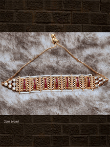 Broad gold chain with side pirohi work and kundan bracelet with ruby stone lines in between - Odara Jewellery