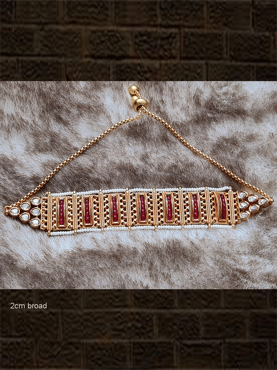 Broad gold chain with side pirohi work and kundan bracelet with ruby stone lines in between - Odara Jewellery