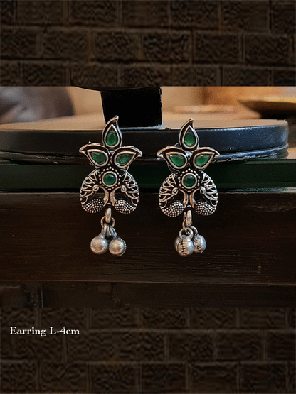 Stone studded inverted peacock design german silver earrings with hanging ghunghru's - Odara Jewellery
