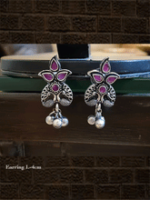 Load image into Gallery viewer, Stone studded inverted peacock design german silver earrings with hanging ghunghru&#39;s - Odara Jewellery