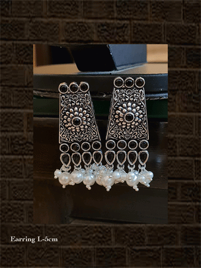 Pearly drop german silver earrings with self design and coloured stone - Odara Jewellery