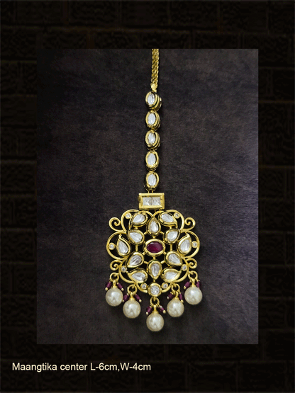 Oval ruby stone kundan intricate design pearl and ruby bead drops maangtika
