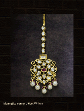 Oval ruby stone kundan intricate design pearl and ruby bead drops maangtika