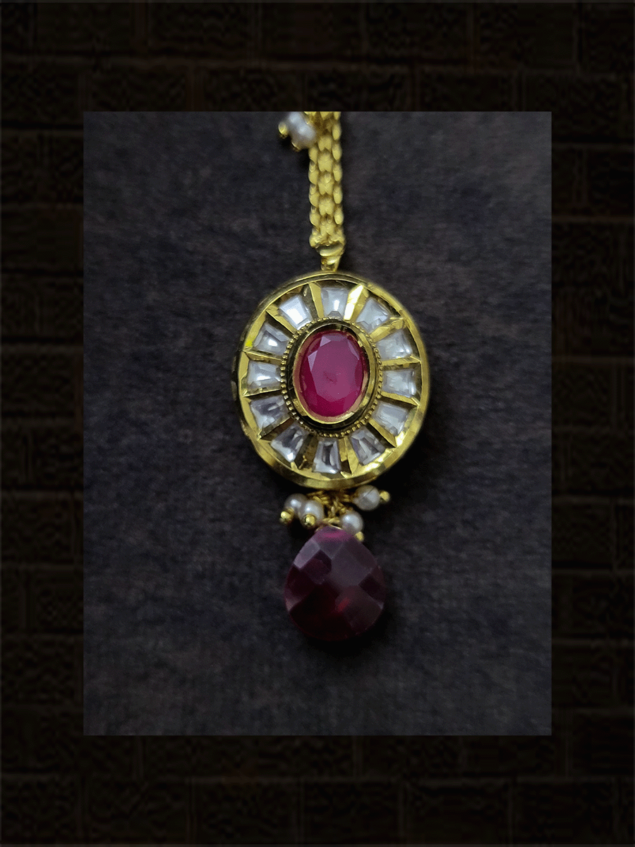Oval kundan with ruby drop chain with pearly hangings maangtika