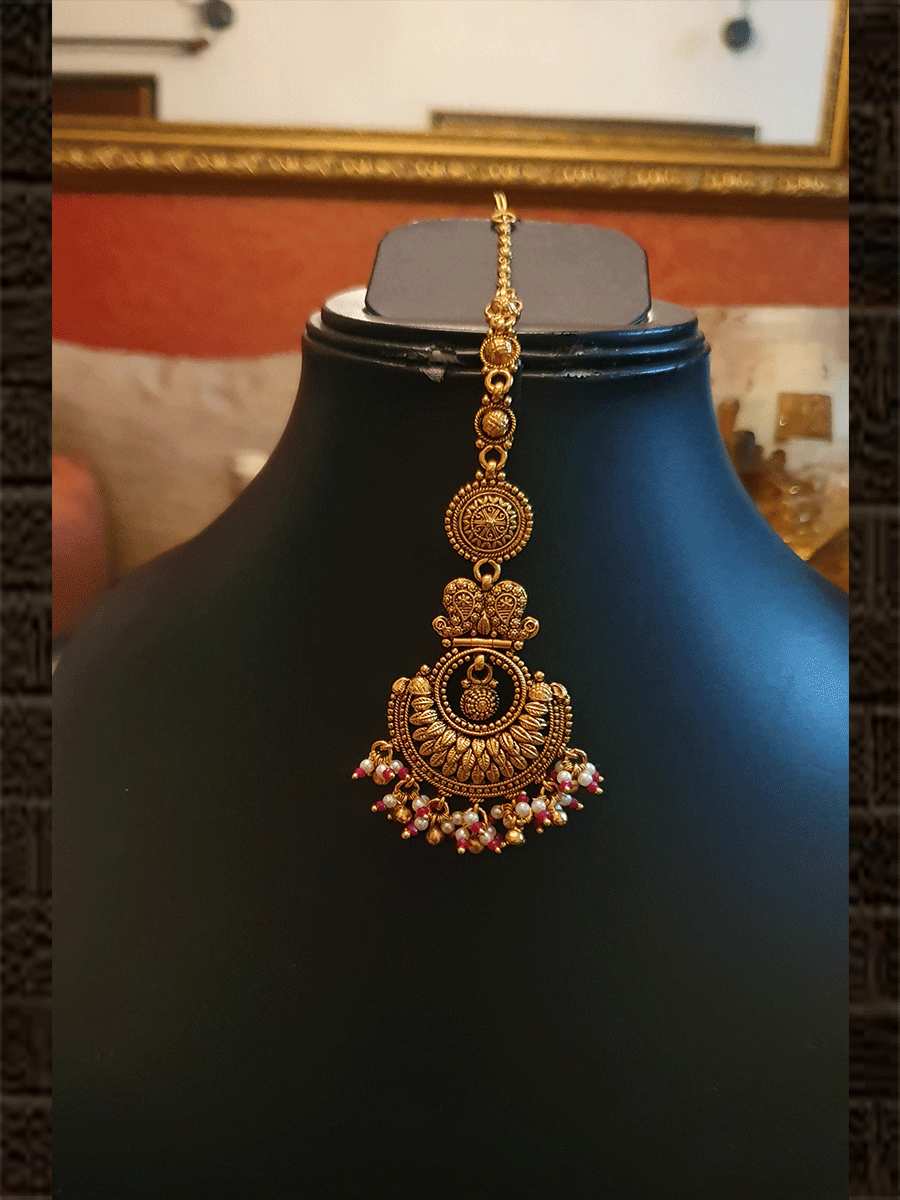Antique gold finish paisley and coin design set with hanging pearly cluster with a hint of ruby beads - Odara Jewellery