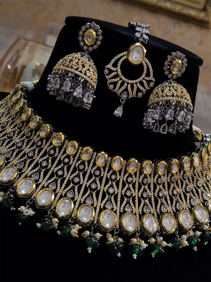 Kundans on both edges of black and gold finish AD set with coloured drops - Odara Jewellery