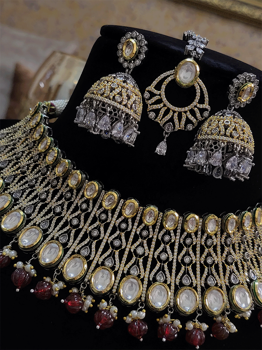 Kundans on both edges of black and gold finish AD set with coloured drops - Odara Jewellery