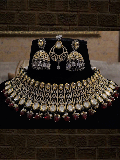 Kundans on both edges of black and gold finish AD set with coloured drops - Odara Jewellery