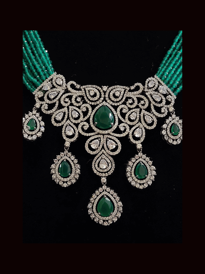 Black finish AD and stone studded multi string neckpiece
