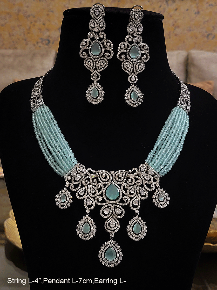 Black finish AD and stone studded multi string neckpiece
