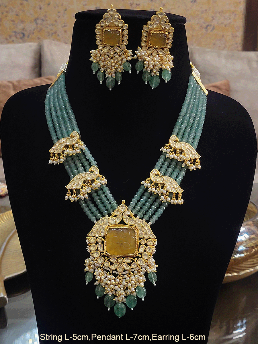 Five jade strings with paachi kundan peacock design tukdies on string and citrine stone pendant set
