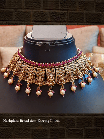 Laxmiji design broad set with ruby stones on one side and pearl hangings on other - Odara Jewellery