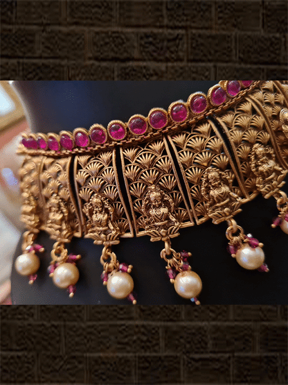 Laxmiji design broad set with ruby stones on one side and pearl hangings on other - Odara Jewellery
