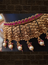 Load image into Gallery viewer, Laxmiji design broad set with ruby stones on one side and pearl hangings on other - Odara Jewellery
