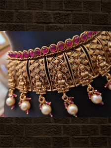 Laxmiji design broad set with ruby stones on one side and pearl hangings on other - Odara Jewellery