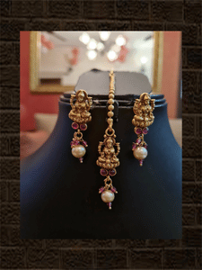 Laxmiji design broad set with ruby stones on one side and pearl hangings on other - Odara Jewellery