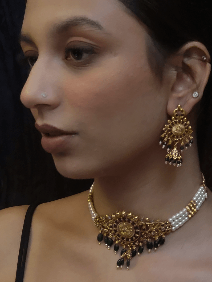Laxmiji motif in circular design choker with side intricate design and green bead drops - Odara Jewellery