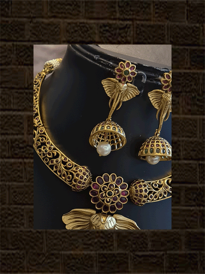 Ruby and green stones flower with long ganpati ji face pendant set with half jhoomki hanging - Odara Jewellery
