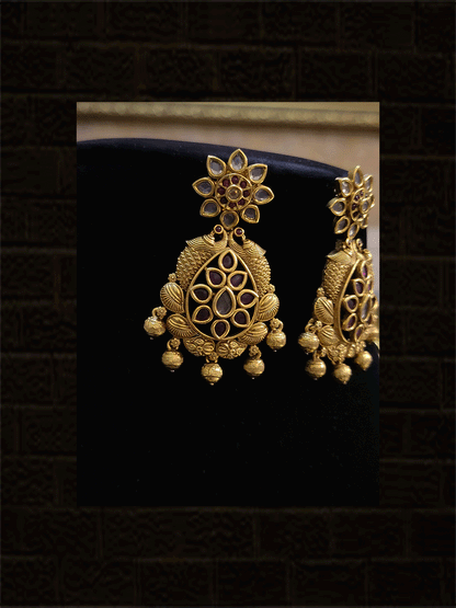 Laxmiji,flower and peacock set studded with polki,ruby and green stones