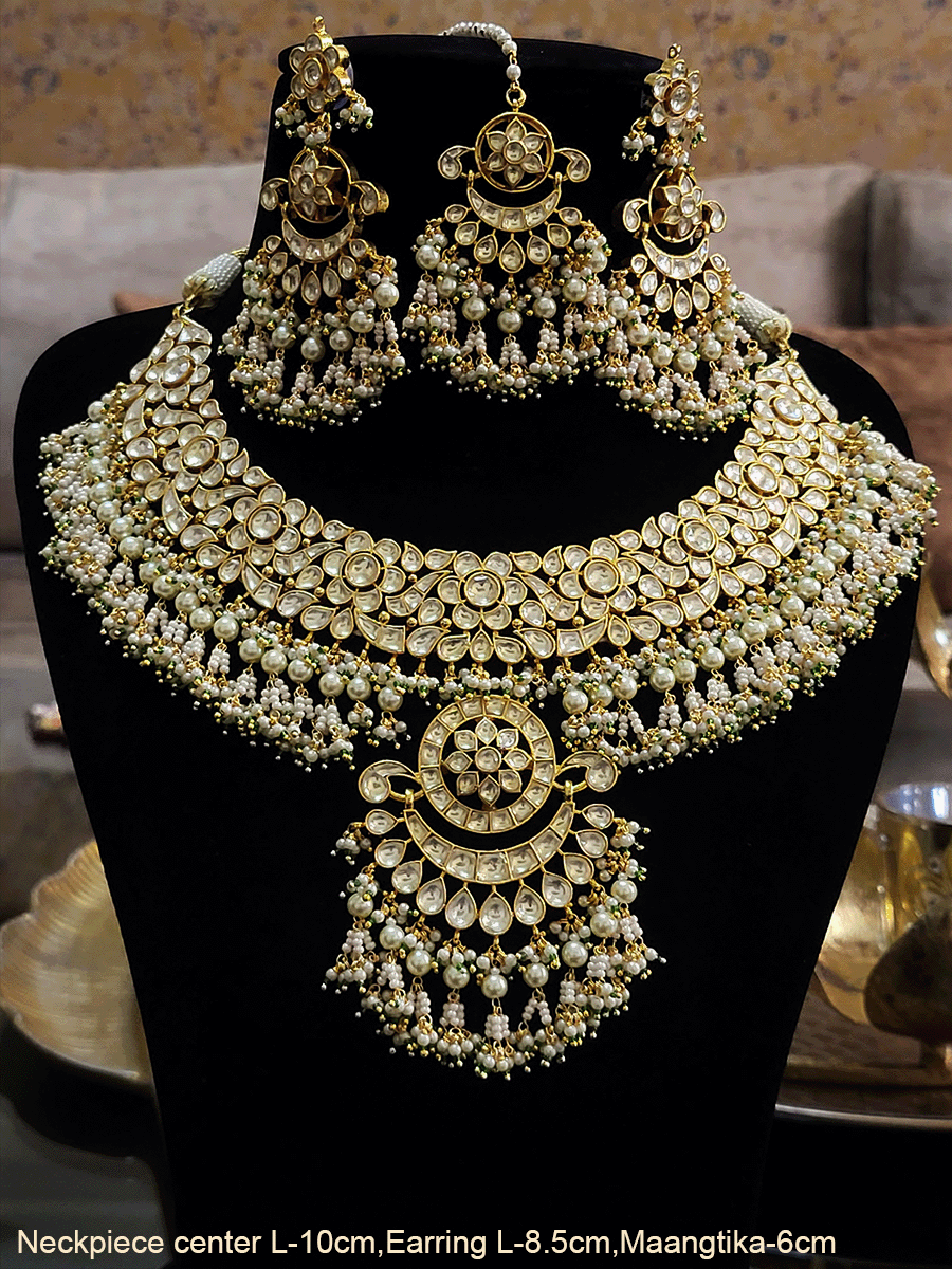 Paachi kundan bridal set with circular center design with pearl bead hangings(base metal brass)