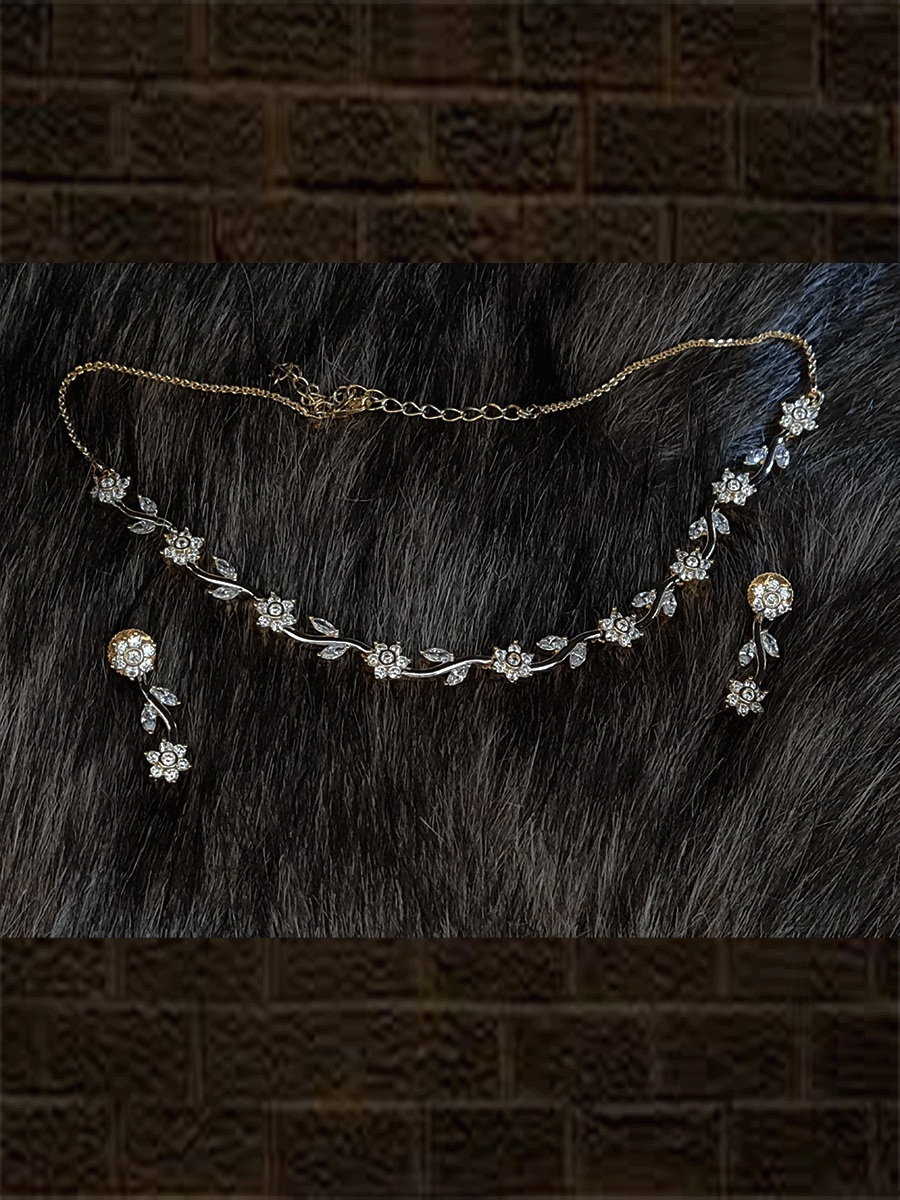 Flower and leaf design delicate AD set in gold finish - Odara Jewellery