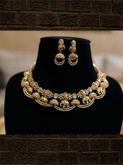 Zircons studded in half jhoomki and elephant design set with rectangular stones - Odara Jewellery