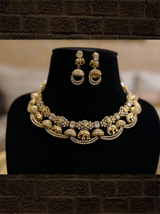 Zircons studded in half jhoomki and elephant design set with rectangular stones - Odara Jewellery