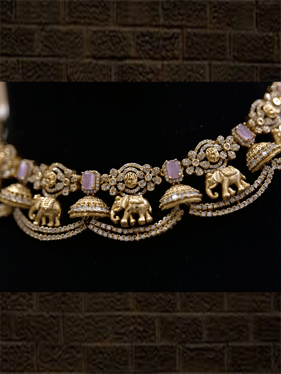 Zircons studded in half jhoomki and elephant design set with rectangular stones - Odara Jewellery