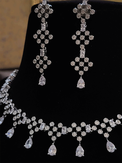 Abstractly linked round AD set with Oval white stone connector and tear drop stone - Odara Jewellery