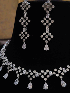 Abstractly linked round AD set with Oval white stone connector and tear drop stone - Odara Jewellery