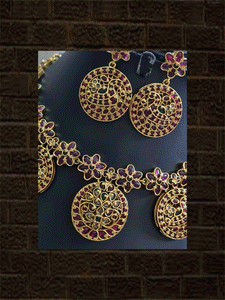 Circular tukdies and flower design polki,ruby and green stones set - Odara Jewellery