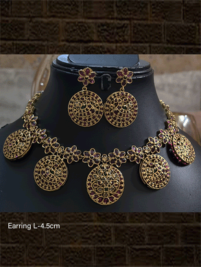 Circular tukdies and flower design polki,ruby and green stones set - Odara Jewellery