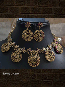 Circular tukdies and flower design polki,ruby and green stones set - Odara Jewellery