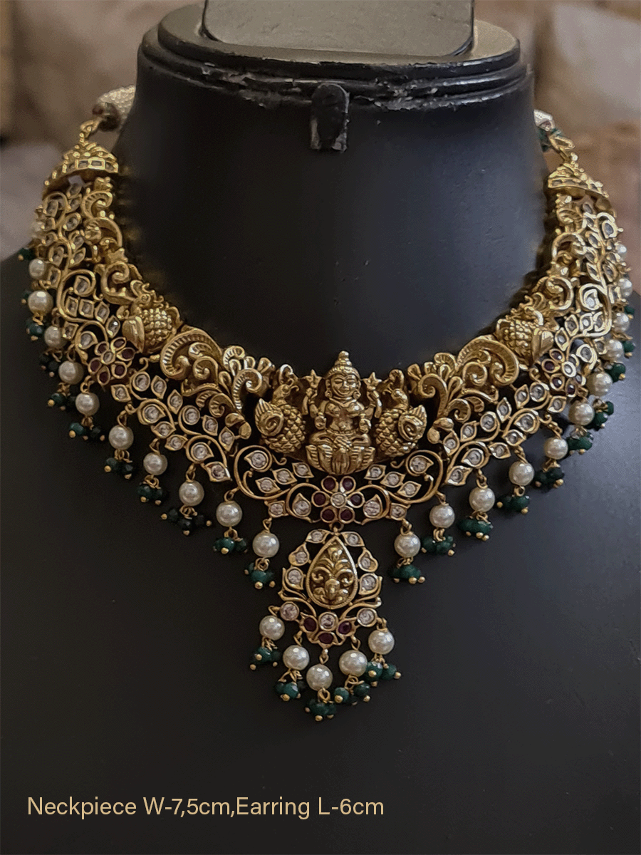 Intricate design polki ,ruby and green stones studded laxmiji set with pearl and green bead drops - Odara Jewellery